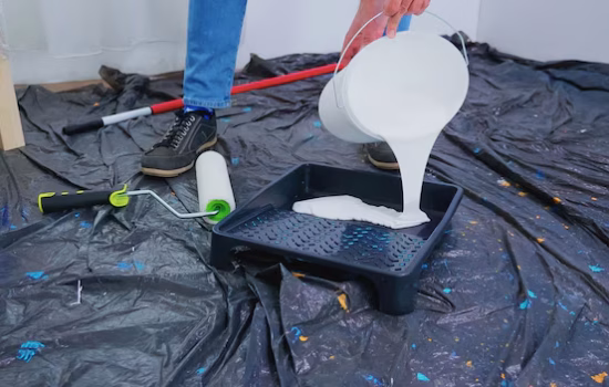 handyman-pouring-white-paint-home-renovation-couple-apartment-flat-repair-makeover_482257-3667